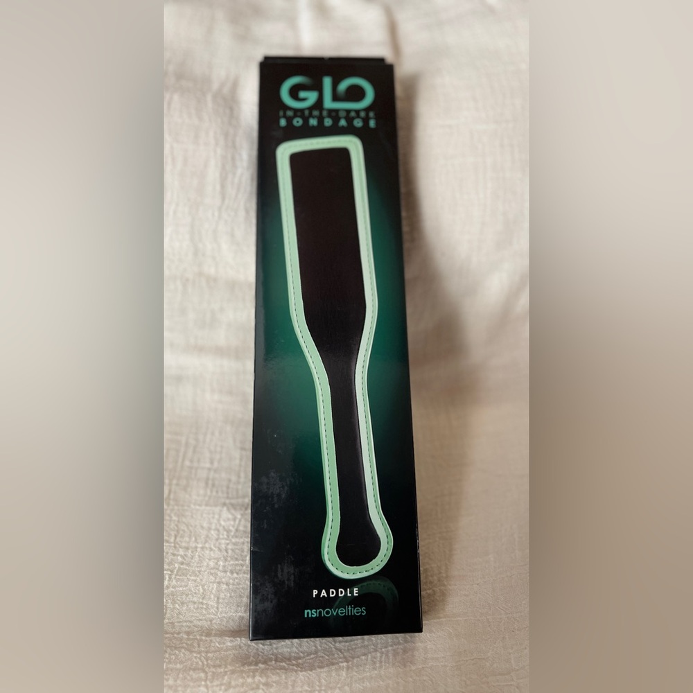 ADULT FUN - NS Novelties GLO in the dark paddle.  Approximately 12” long.